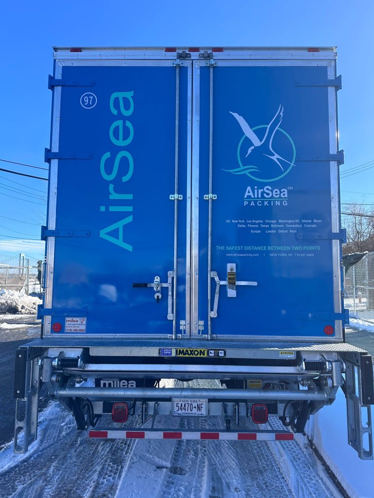 AirSea Packing box truck rear doors with blue vinyl wrap graphics by Vinyl Images NY